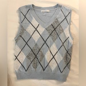 Blue knitted sweater vest